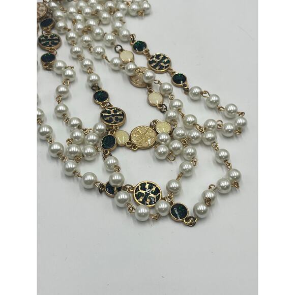 Tory Burch Authentic Long
Pearl Logo Medallion
Multi-Strand Gold 60" Necklace - Picture 14 of 15